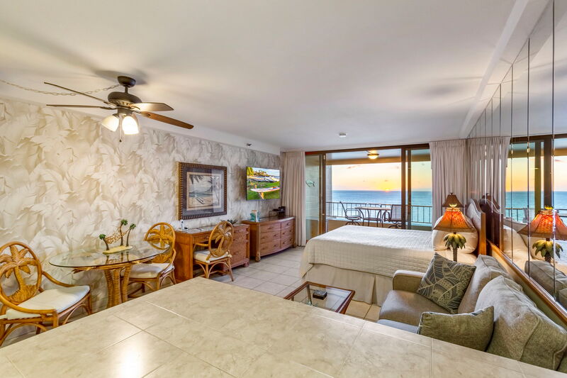 Maui Kai 806 large west-facing private lanai with bar high chairs and unobstructed ocean views